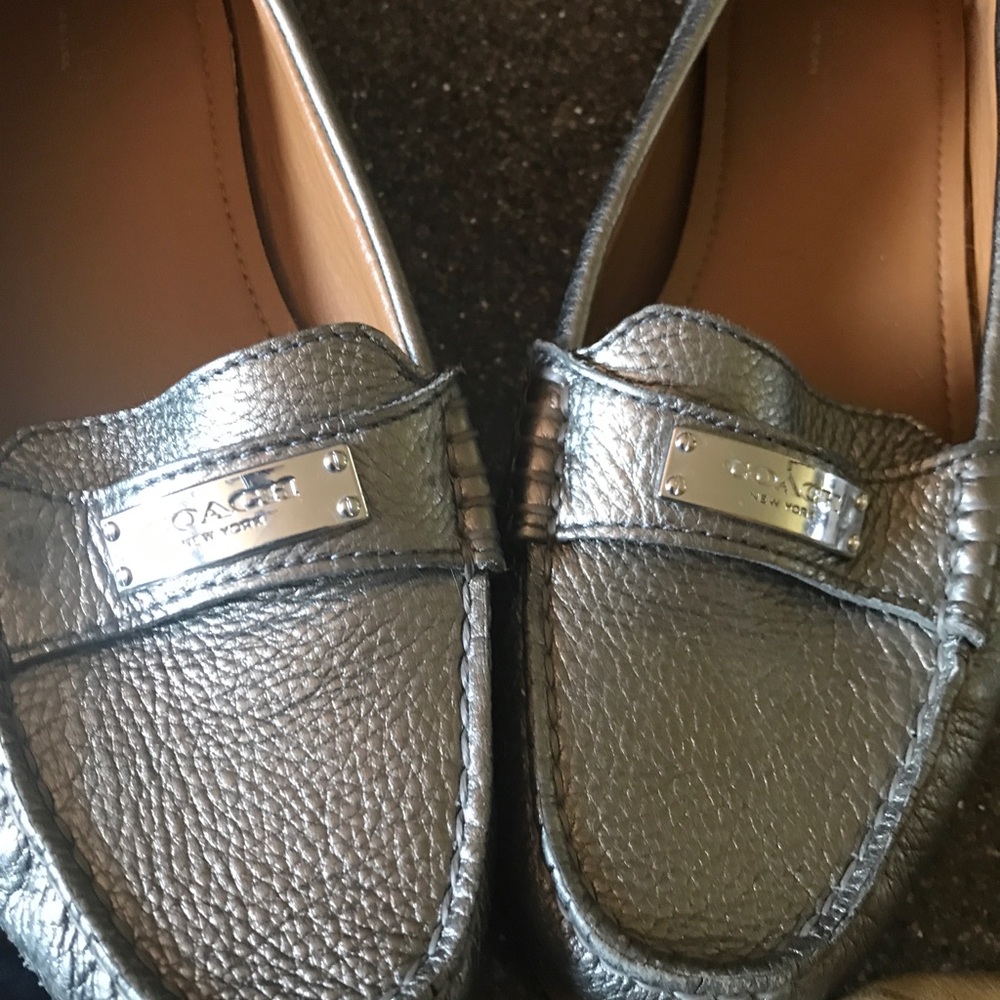Three pairs of Coach slip on’s